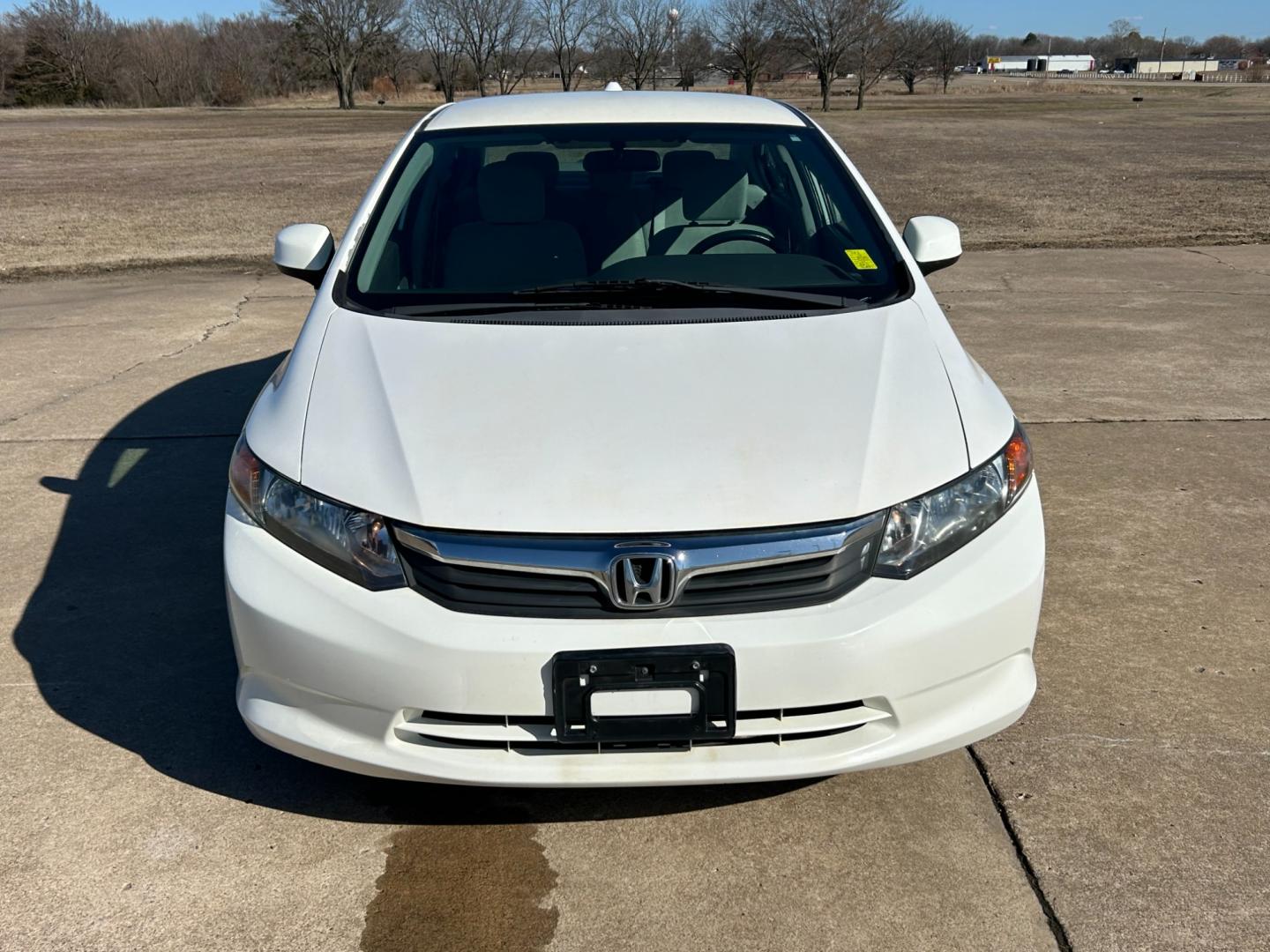 2012 White /Gray Honda Civic CNG Sedan 5-Speed AT (19XFB5F53CE) with an 1.8L L4 SOHC 16V CNG engine, 5-Speed Automatic transmission, located at 17760 Hwy 62, Morris, OK, 74445, (918) 733-4887, 35.609104, -95.877060 - 2012 HONDA CIVIC 1.8L FWD DEDICATED CNG (COMPRESSED NATURAL GAS) VEHICLE. FEATURES REMOTE KEYLESS ENTRY, POWER LOCKS, POWER WINDOWS, POWER MIRRORS, MANUEL SEATS, AM/FM RADIO, CD PLAYER, USB, AUX, BLUETOOTH FOR HANDS-FREE CALLING, 12V POWER OUTLET, CRUISE CONTROL, TRACTION CONTROL, AND CLOTH SEATS. 1 - Photo#1